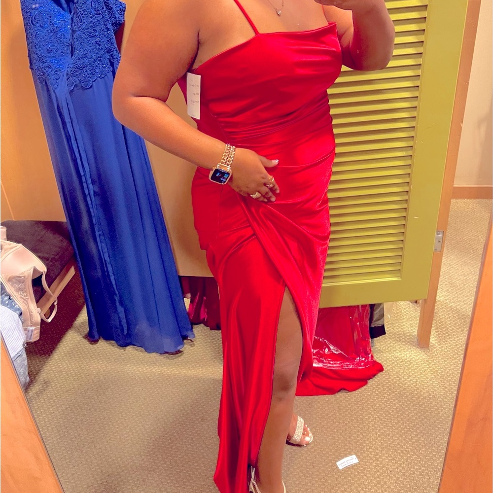 Beautiful formal red dress contours body well. It’s comfy and light, classy slit